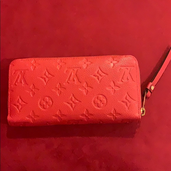 LV red leather Empreinte zippy wallet